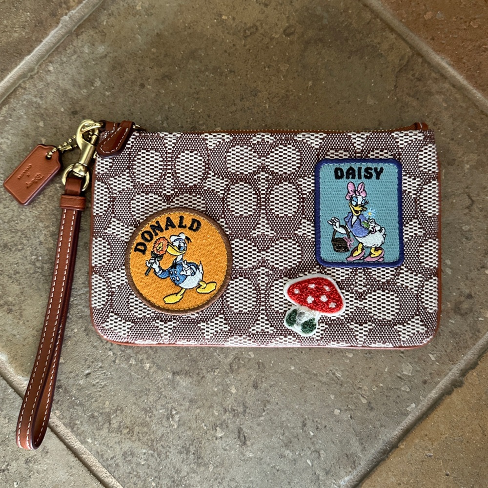 Coach x Disney Donald and Daisy Duck Wristlet